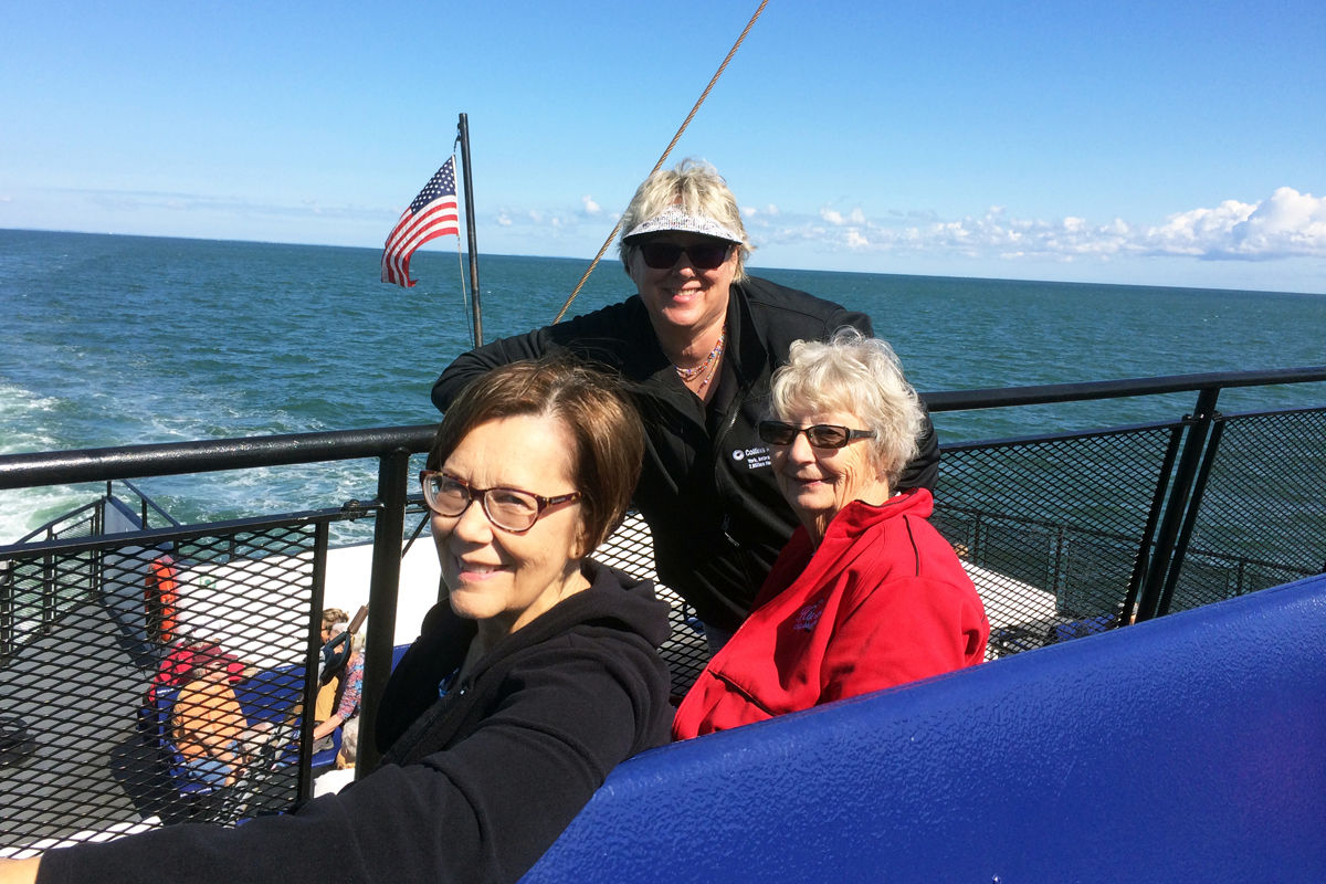 094 Pat Willis, Rynee Spencer and Joyce Dose enjoy the sunny ride to Nantucket Island.jpg